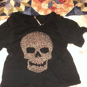 Black skull shirt , back of shirt has cut out skull as well